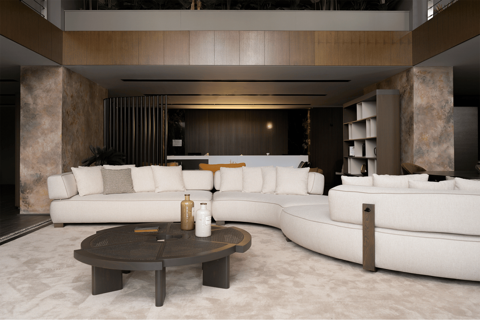 Curved Modular Sofa styled in a contemporary living room with complementary decor.