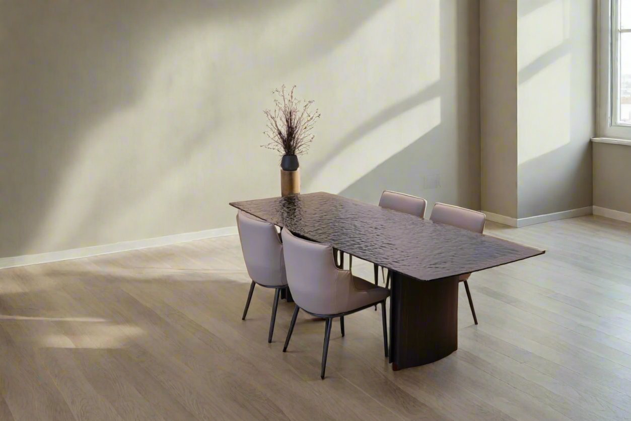 Front view of the Flow Dining Table featuring a sleek minimalist design with clean lines.