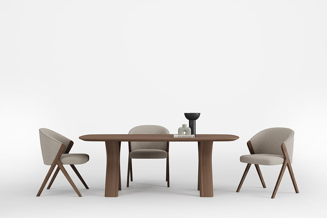 Side angle of the Koza Dining Chair highlighting its sleek lines and ergonomic comfort.