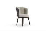 Front view of the Lupa Dining Chair showcasing its sleek, modern design and elegant finish.