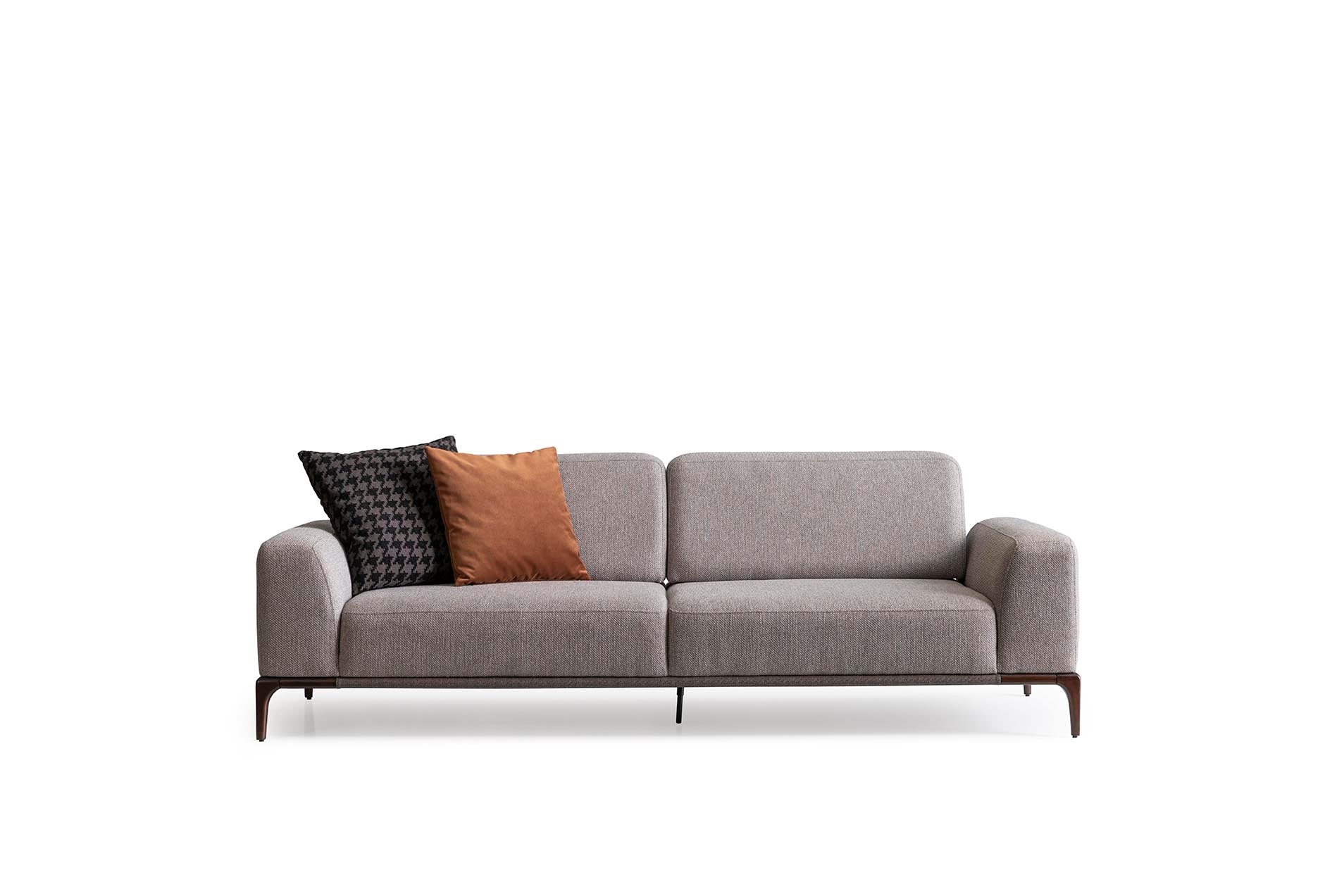 Nympha Sofa styled in a contemporary living room, adding elegance and coziness to the space.