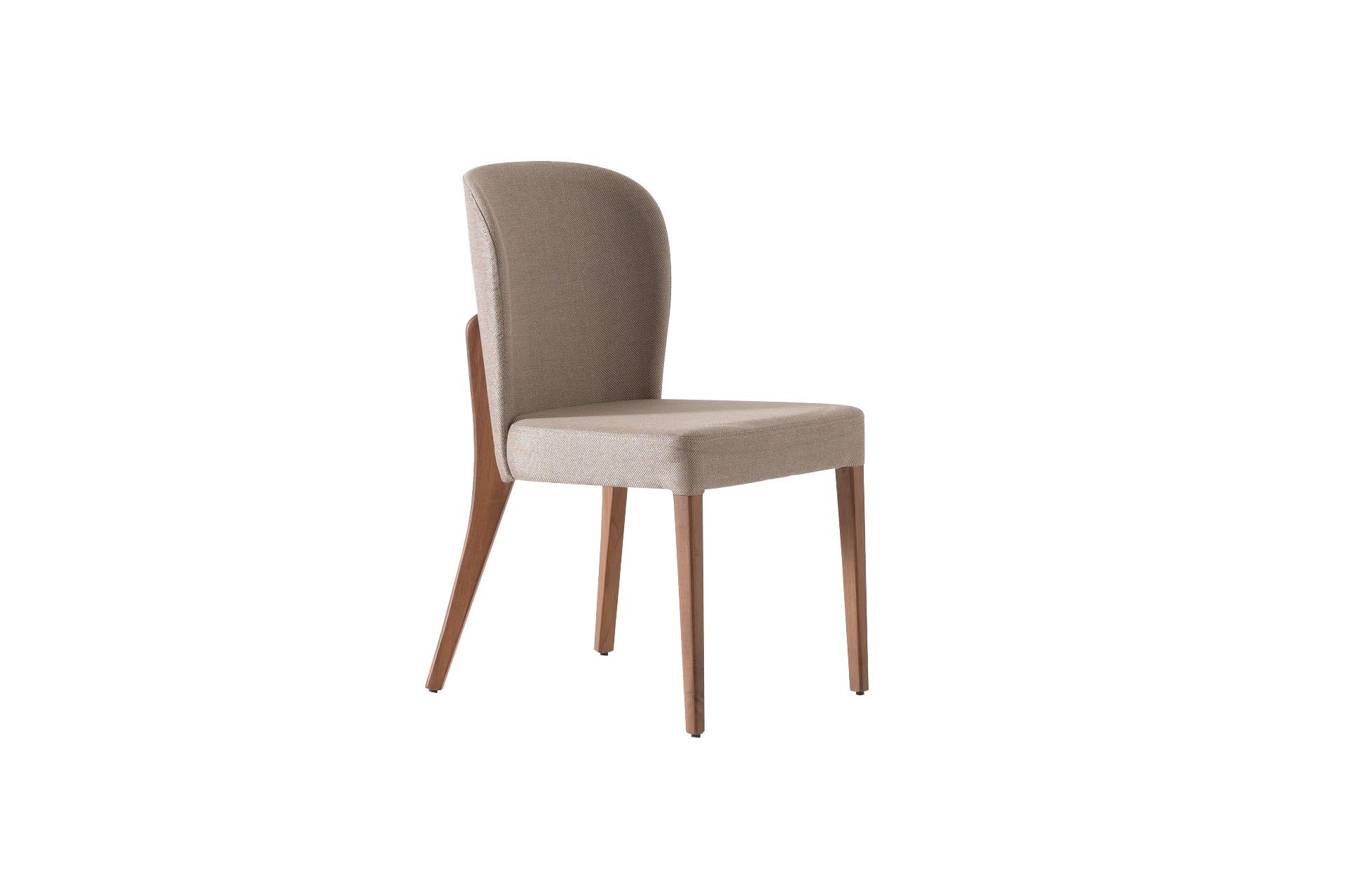 Front view of the Vokka Dining Chair showcasing its sleek modern design and comfortable seating.