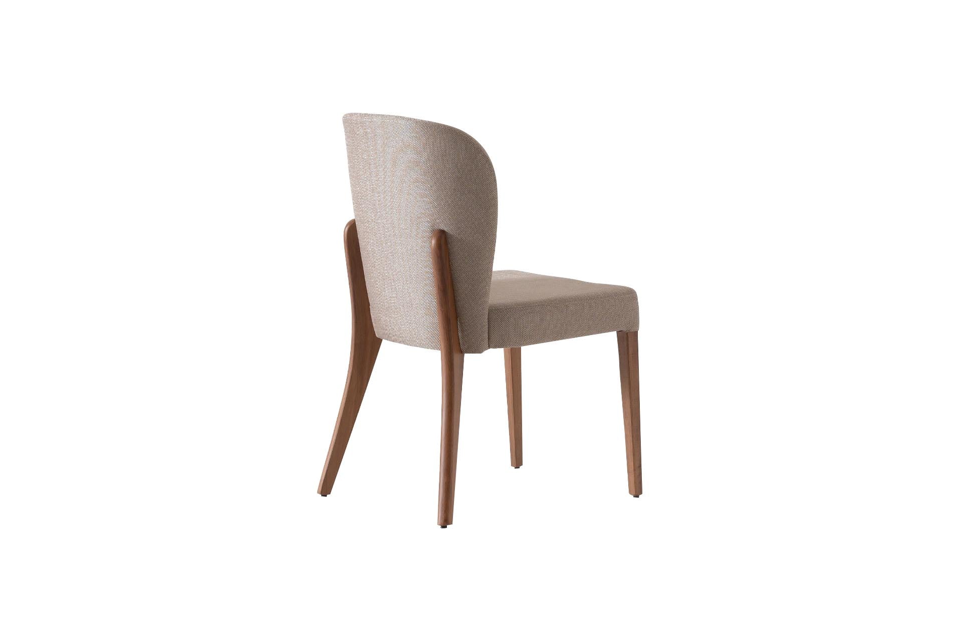 Side angle of the Vokka Dining Chair highlighting its ergonomic design and premium craftsmanship.