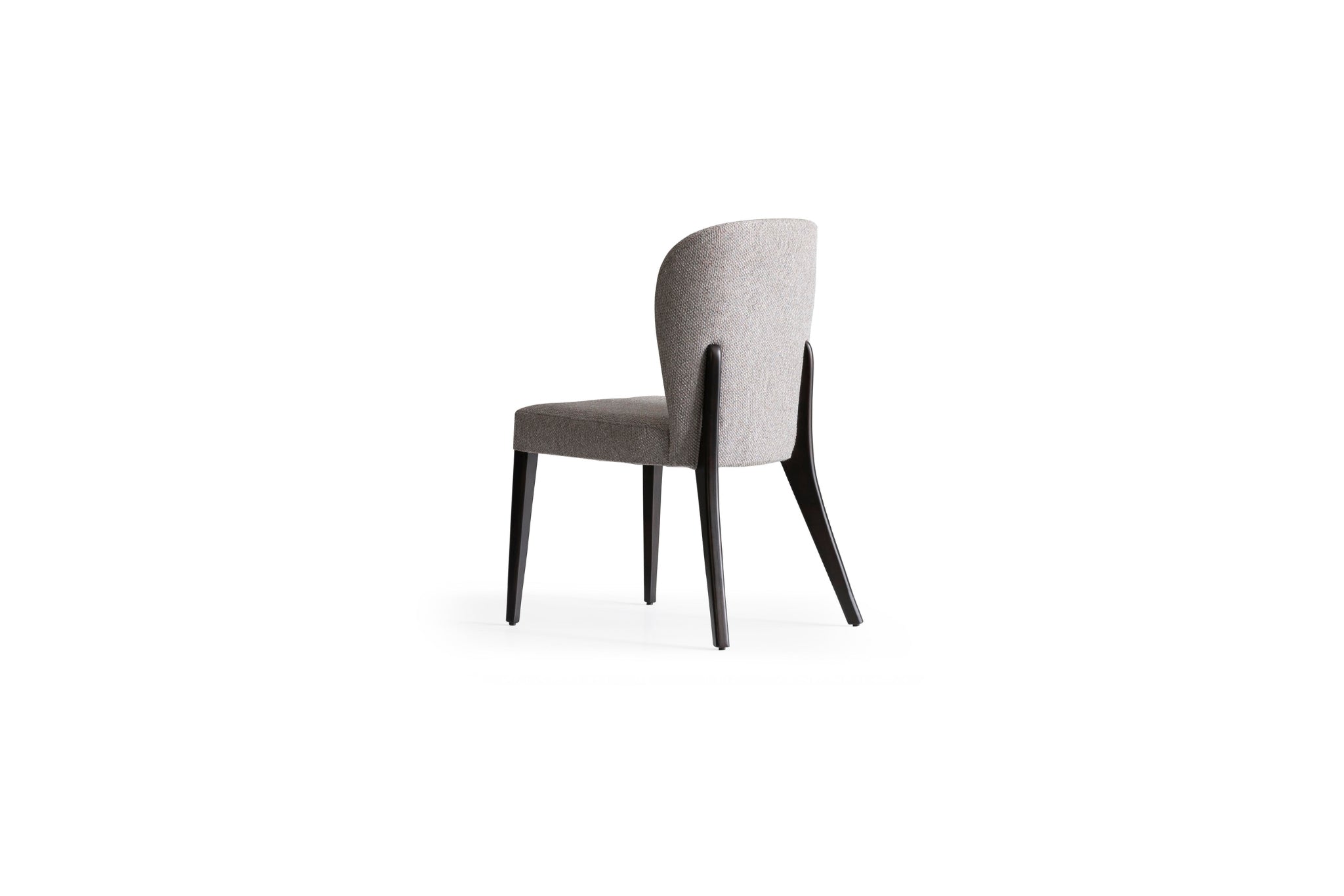 Vokka Dining Chair paired with a dining table, creating a cohesive and stylish dining setup.